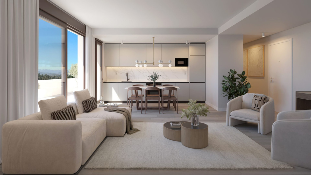 Greenity – Mijas - open-plan living room and kitchen with beige sectional sofa, marble backsplash, and panoramic mountain views