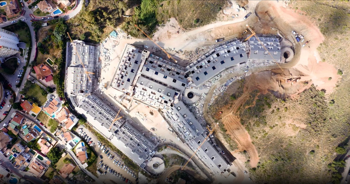 Medhills Fuengirola – Fuengirola - aerial drone view of luxury new-build residential complex under construction on hillside