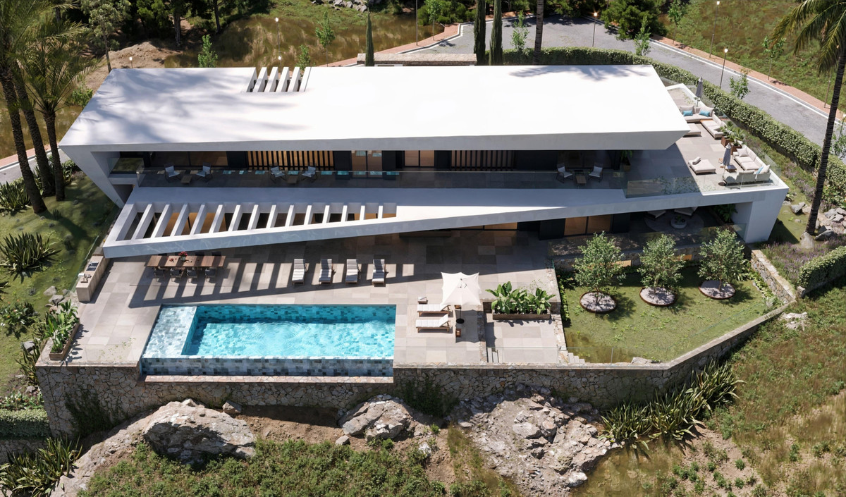 VILLA HORIZON Cortesín – Casares - aerial view of modern luxury villa with infinity pool, terraces and landscaped gardens