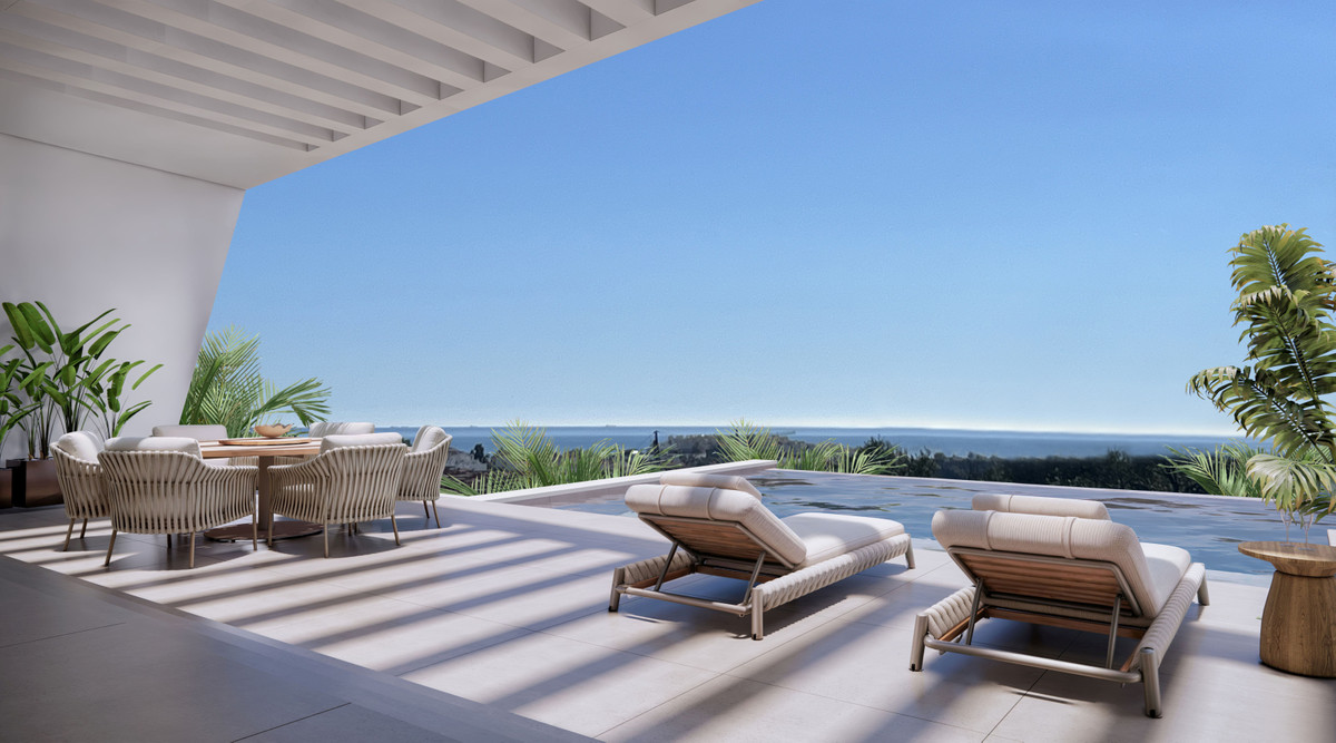 VILLA HORIZON Cortesín – Casares - luxury terrace with infinity pool, sun loungers, and panoramic sea views