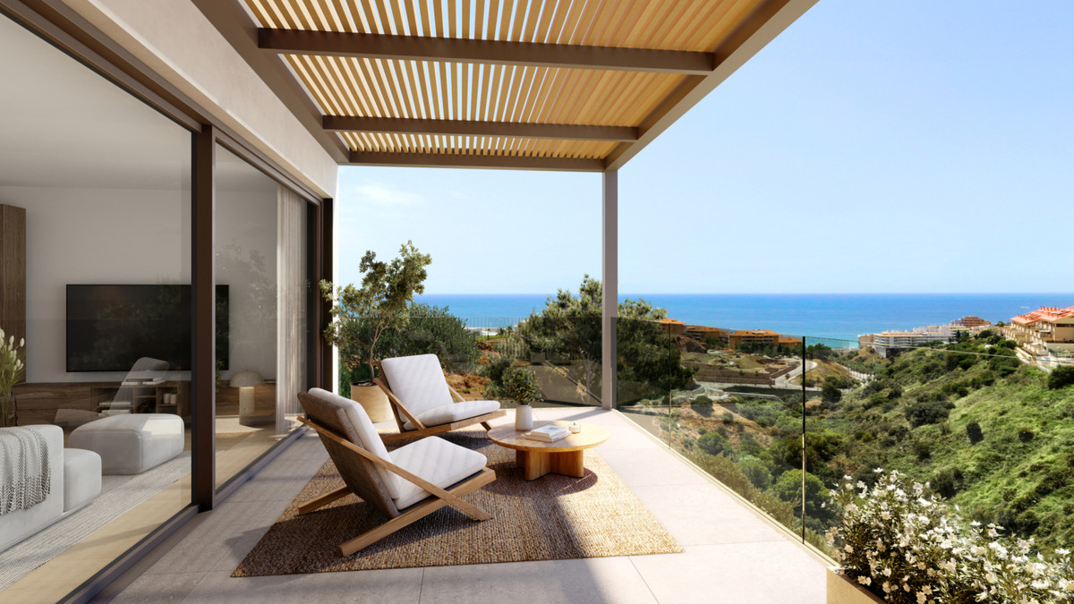 Veridian II – Fuengirola - sun terrace with lounge chairs, pergola, and panoramic Mediterranean sea views