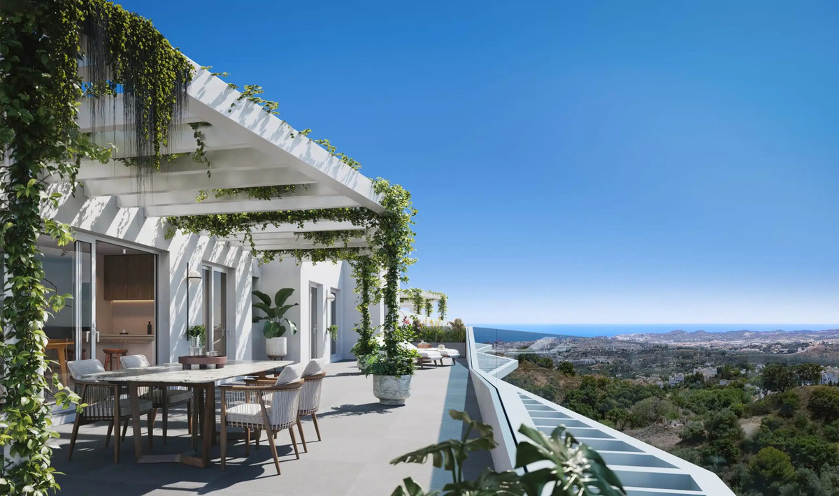 Mijas Seaviews FASE II – Mijas - luxury terrace with outdoor dining, pergola draped in climbing plants and panoramic sea views