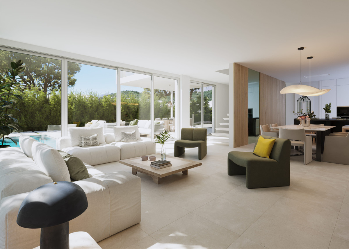 Villas Monte Palatino – Valle Romano - bright open-plan living room with floor-to-ceiling glazing, pool views and green garden beyond