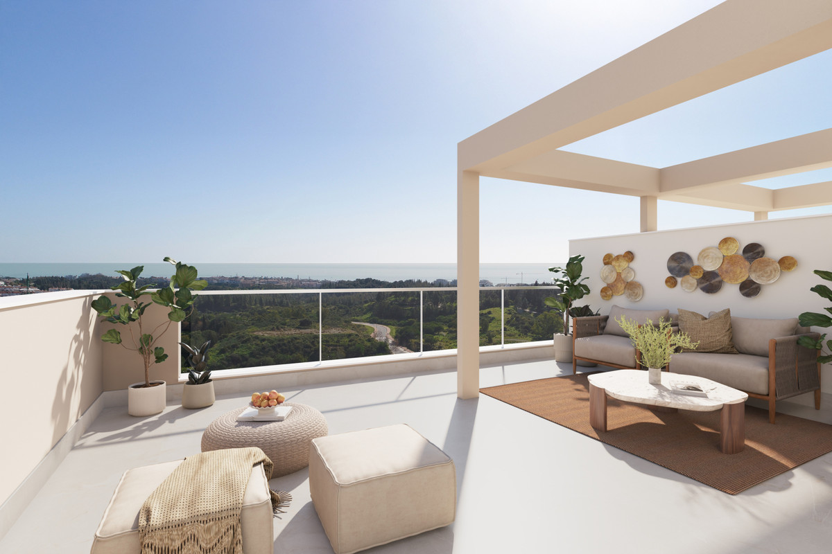 Valley Views – FASE 1 – Mijas - rooftop terrace with outdoor lounge seating, pergola, and panoramic sea and forest views