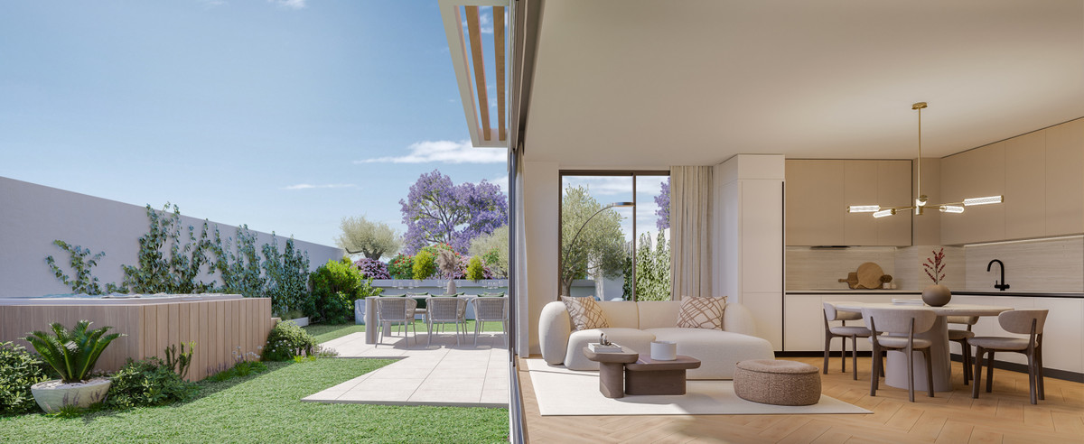 Ykines – Torremolinos - open-plan living room and kitchen flowing onto a landscaped garden with hot tub and dining terrace